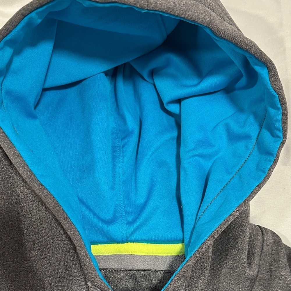 Under Armour Storm Semi Fitted Charcoal Gray Hoodie with Blue and Yellow logo. - Picture 5 of 7